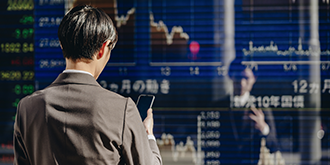 A man checking the stock exchange.